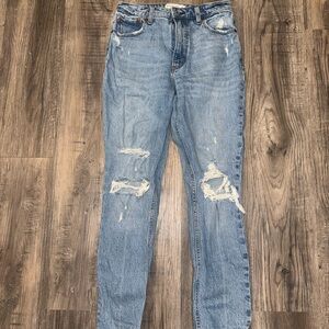 Light Blue Distressed Boyfriend Jeans with Vintage Appeal